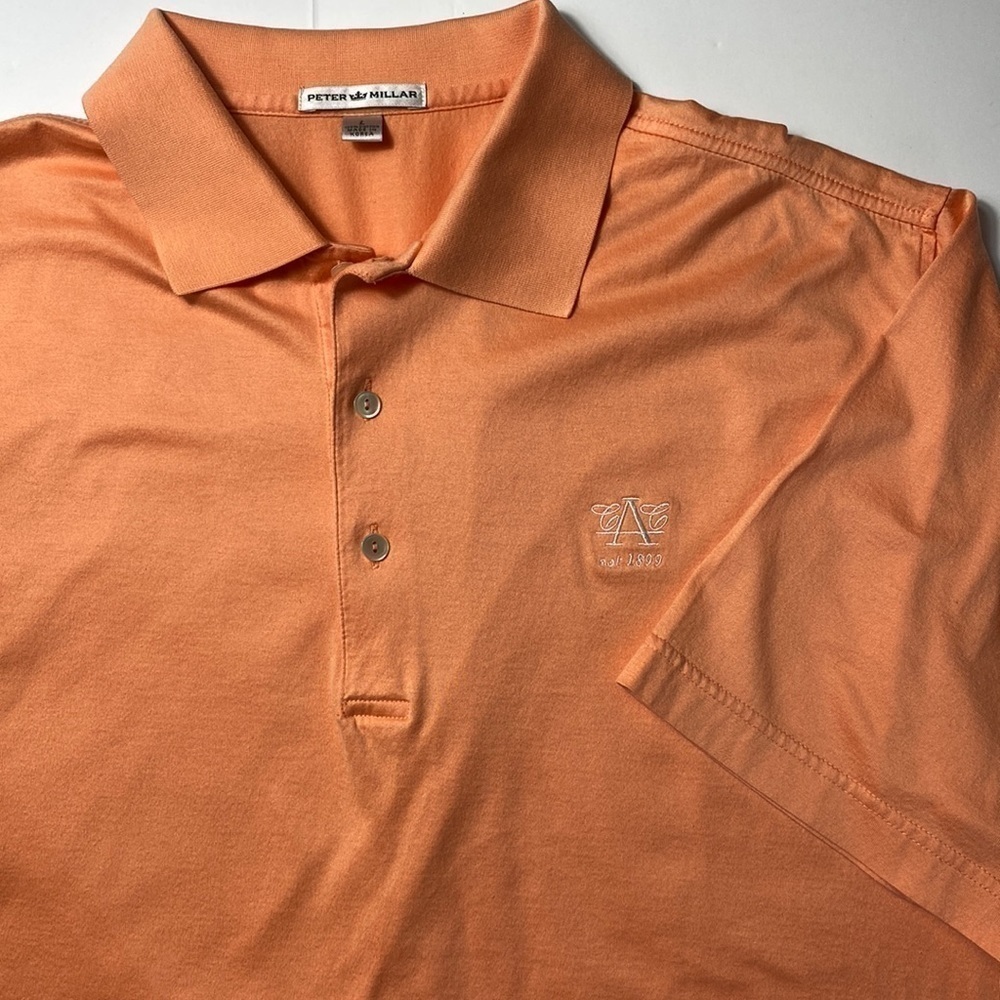Peter Millar short sleeve golf shirt Size L 100% cotton light orange peach color